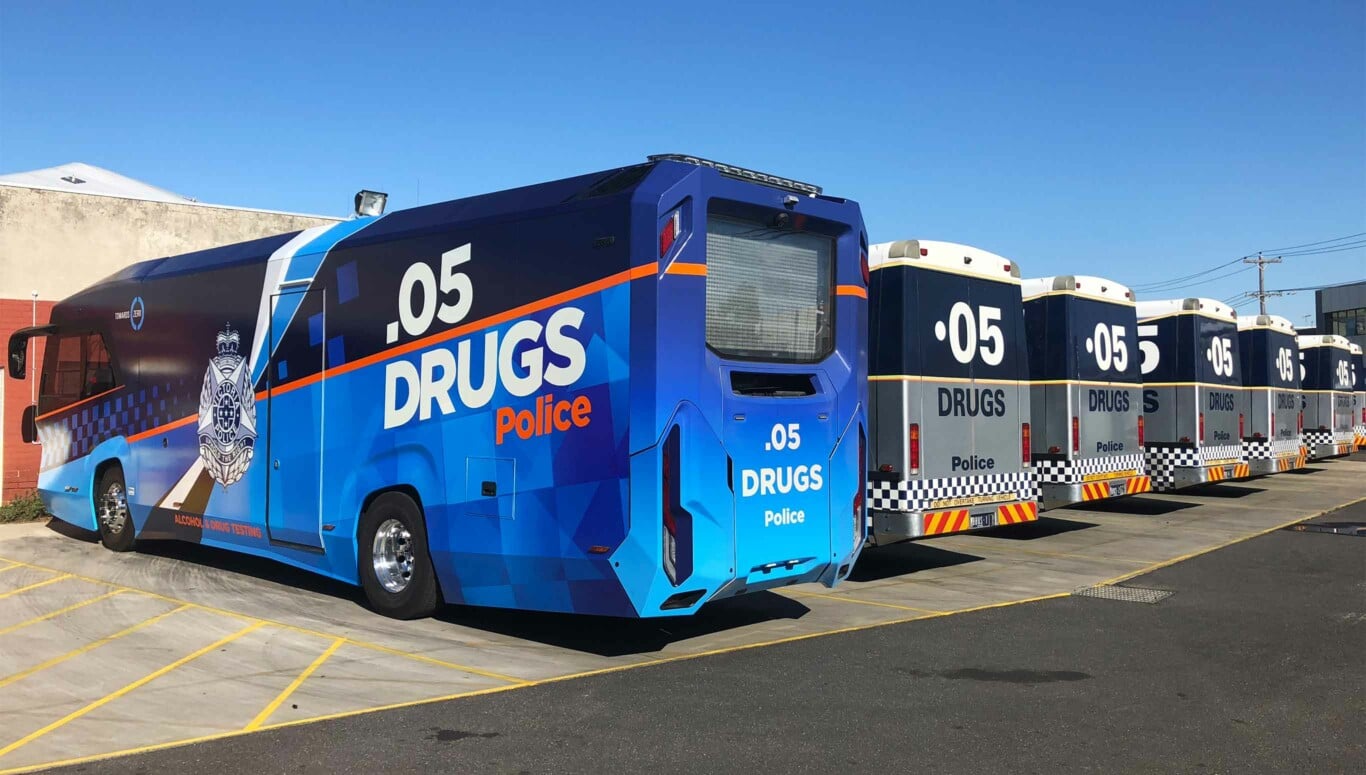 New Victoria Police ADT3 parked next to a fleet of previous ADT2 buses