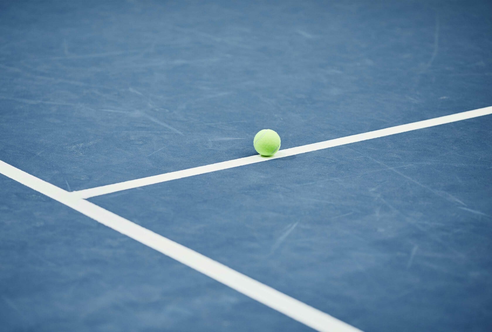 Tennis ball on tennis court